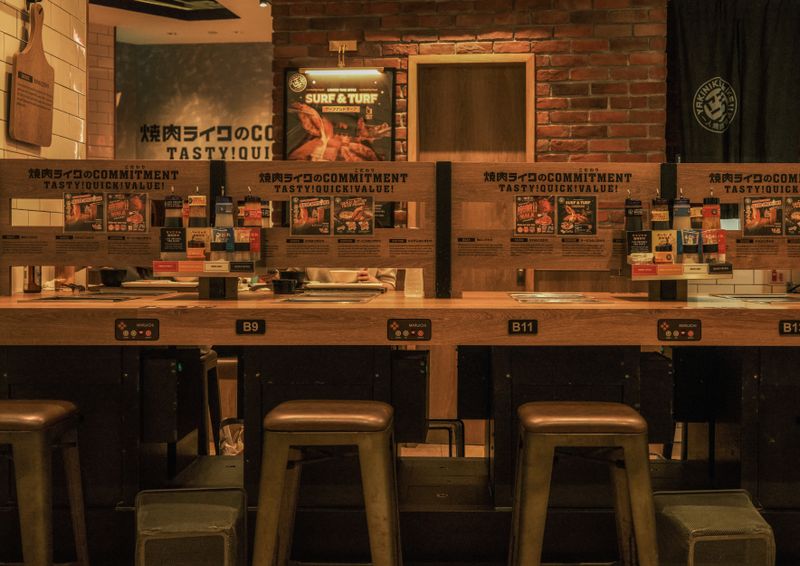 Wing Snob restaurant dining area with warm lighting